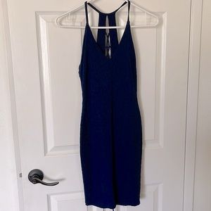 Very sexy, dark blue body, hugging dress perfect for a single ladies night out